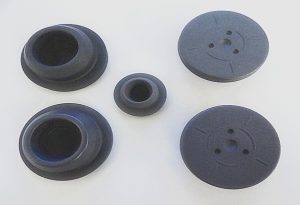 Medical bottle stopper with parylene coating